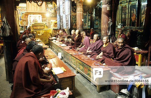 India  Ladakh  monks praying inside Hemis Gompa monastery