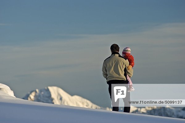Austria  Carinthia  Villach  Dobratsch Natural Park  Father and son in a snow