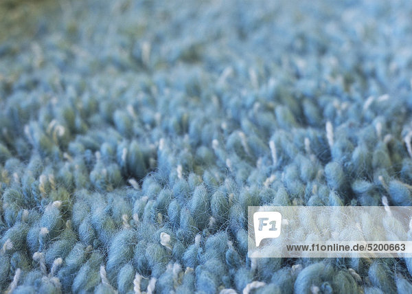 Blauer Flokati-Teppich Detail