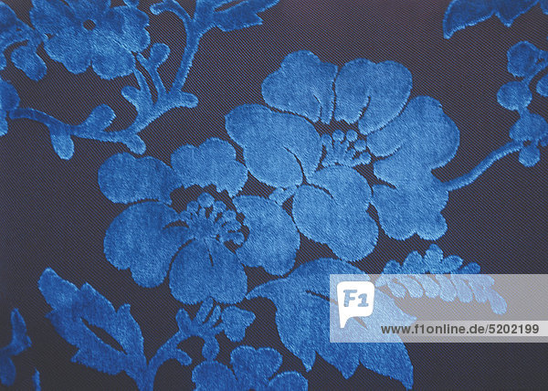 Stoff mit Blumenmuster  blau  braun
