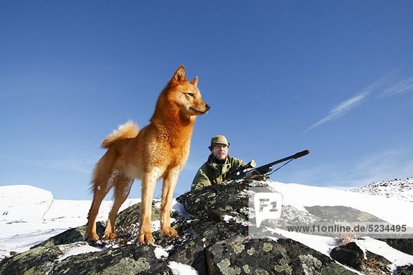 Jäger und Hund