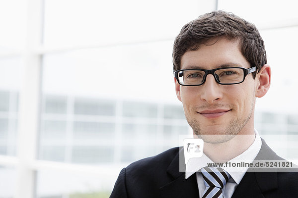 Germany  Bavaria  Diessen am Ammersee  Close up of businesssman  smiling  portrait