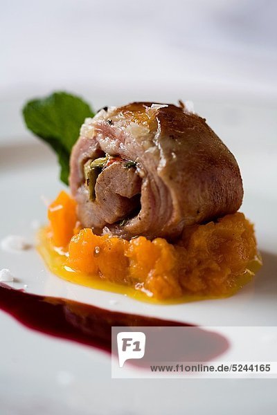 Segureño lamb loin stuffed with vegetables on pumpkin and sherry vinegar reduction Restaurant ´Ruta del Veleta´ Granada  Andalucia  Spain