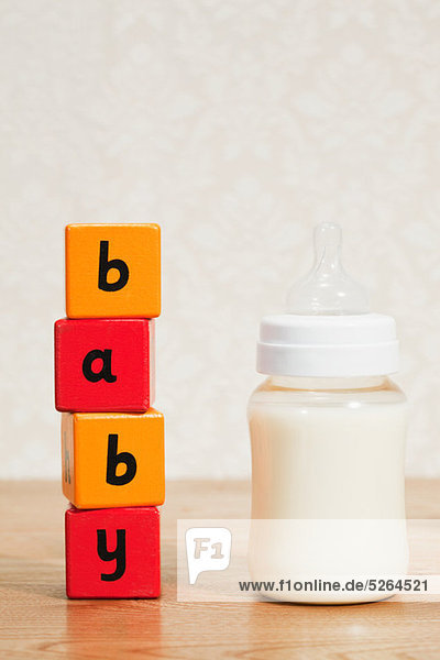 Baby formula and alphabet blocks