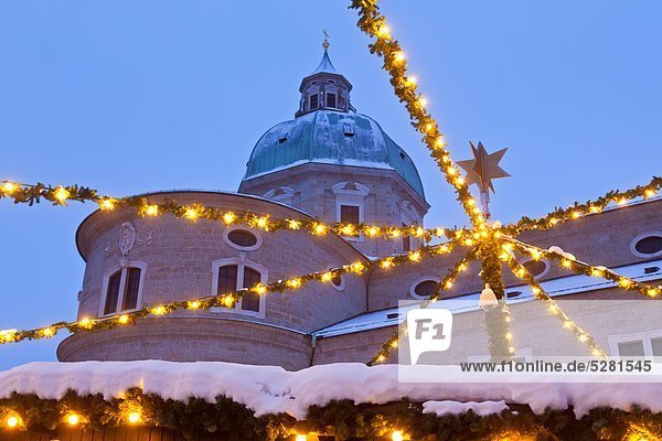 Salzburg Cathedral with lights of the Christmas Market Salzburg Austria
