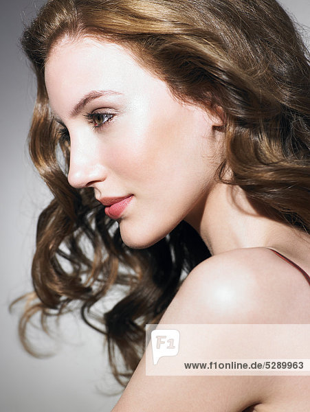 Portrait of radiant girl with glowing skin