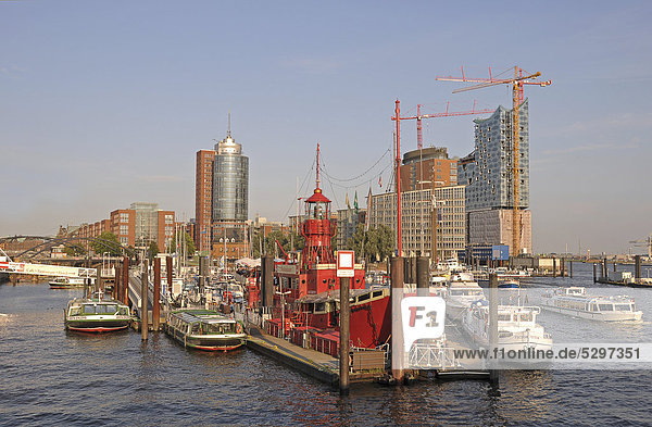 Port of Hamburg with a lightship  Kehrwiederspitze and Elbe Philharmonic Hall  Hamburg  Germany  Europe