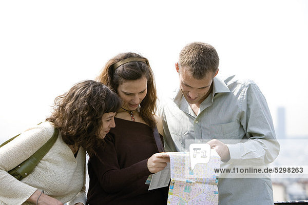 Tourists consulting map