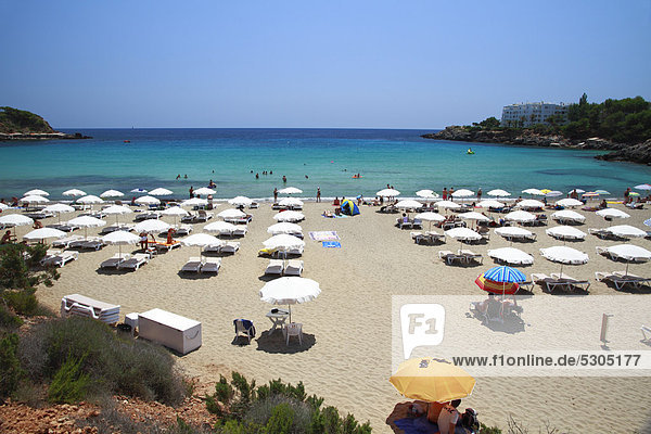 Sunshades on the beach of Cala Lenya  Ibiza  Spain  Europe