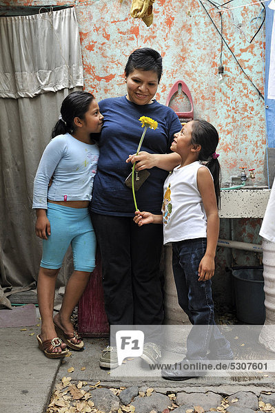 Girls giver their mother a flower  Queretaro  Mexico  North America  Latin America