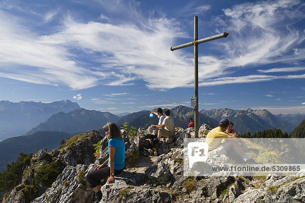 Summit cross on the summit of Ettaler Mandl Mountain  Ammergau Alps  Ammer Mountains  Upper Bavaria  Bavaria  Germany  Europe