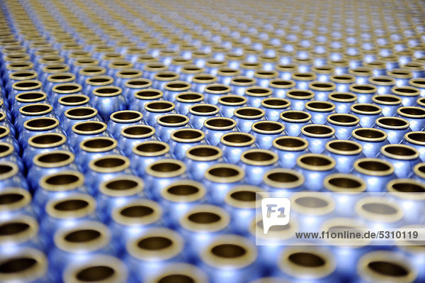 Empty aluminum bottles before being filled with deodorant  German cosmetics manufacturer