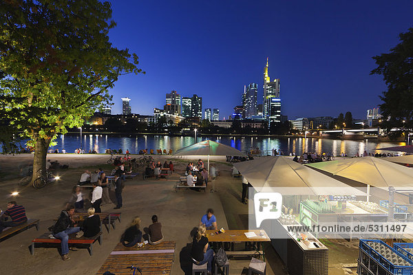 Beer gardens on the River Main at night  Commerzbank building  EZB and Hessische Landesbank at back  Frankfurt am Main  Germany  Europe  PublicGround