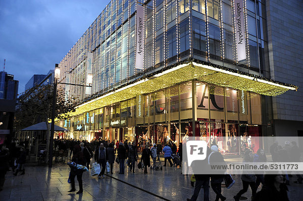Shopping mall with Christmas decoration in the evening  pedestrians on The Zeil street  Frankfurt am Main  Hesse  Germany  Europe