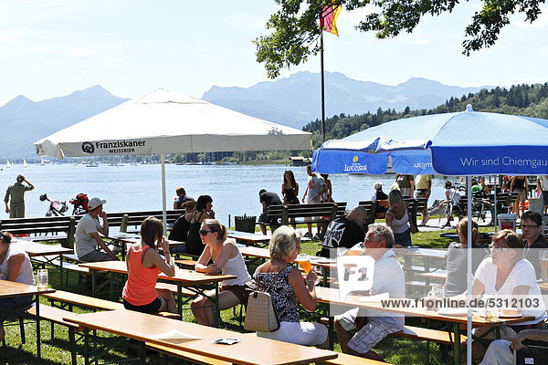 Beer garden on the Prien Stock peninsula  lake Chiemsee  Chiemgau  Upper Bavaria  Germany  Europe