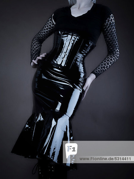 Woman  Gothic  dress  glossy vinyl dress with corset  standing