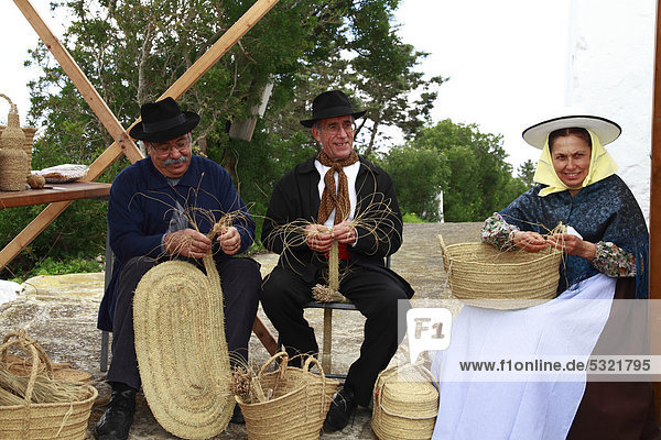 People in traditional costume at a handicraft fair  Ibiza  Spain  Europe