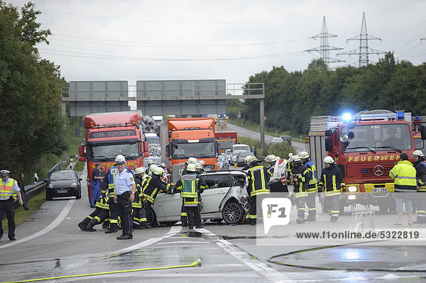 Firefighters in a rescue operations following a serious road traffic accident on the Autobahn A81 motorway  Ludwigsburg  Baden-Wuerttemberg  Germany  Europe