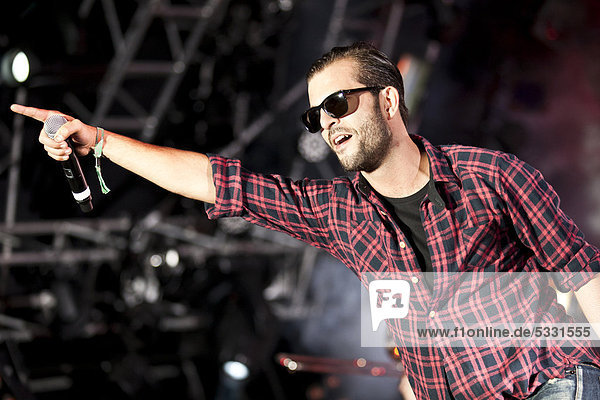 Swiss rapper Marco Bliggensdorfer aka Bligg playing live at the Heitere Open Air music festival in Zofingen  Switzerland  Europe