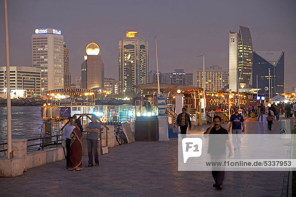 Evening light on the promenade alongside Dubai Creek in Dubai  United Arab Emirates  Middle East  Asia