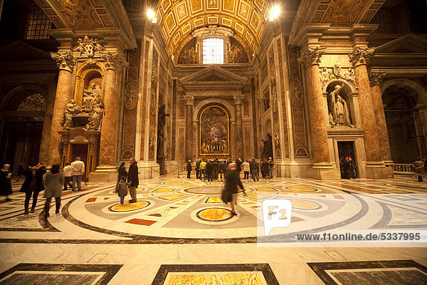 Visitors in the interior  St. Peter's Basilica  Vatican City  Rome  Lazio  Italy  Europe