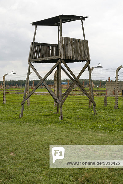 Fence and guard tower in the concentration camp  Auschwitz-Birkenau  Poland  Europe