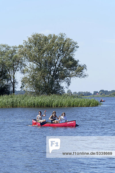 Canoeing on Lake Gartow  Naturpark Elbufer-Drawehn nature reserve  Lower Saxony  Germany