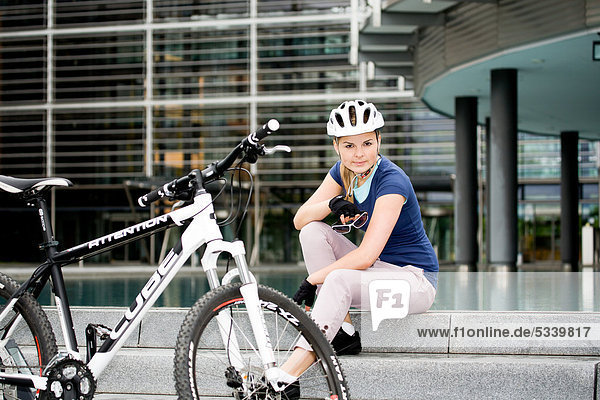 Female cyclist in an urban surrounding