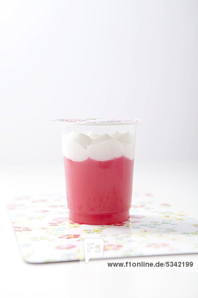 Pink jelly with whipped cream