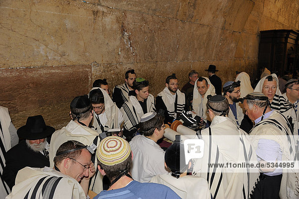 Bar Mitzvah Jewish coming of age ritual Western Wall or Wailing Wall Old City of Jerusalem Arab Quarter Israel Middle East