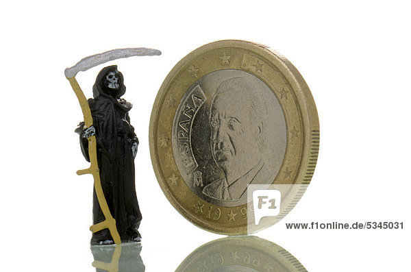 Der Tod steht neben einer spanischen Euromünze  Symbolbild Eurokrise