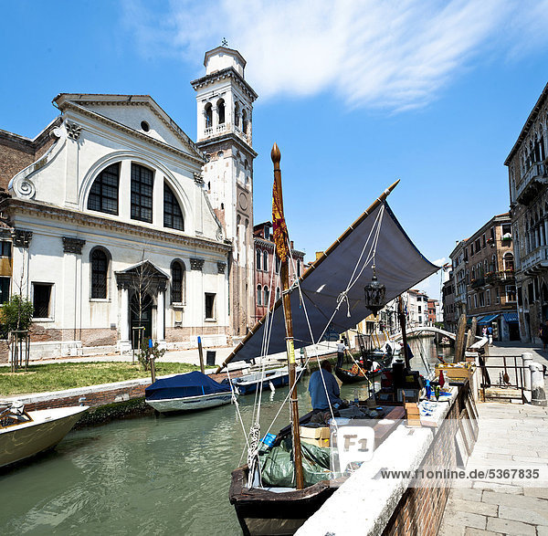 Flea market on a boat at the Church of San Trovaso  Sestiere Dorsoduro district  Venice  Italy  Europe