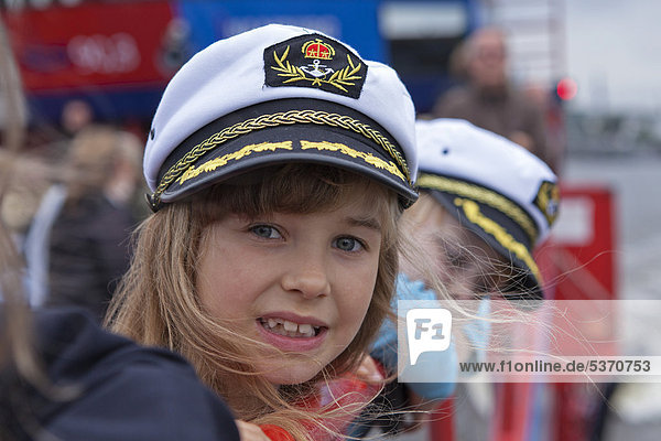 Children wearing captain's hats  harbour  Hamburg  Germany  Europe