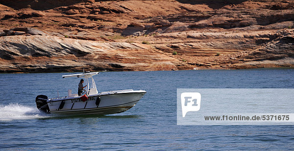 State Patrol  police boat  Lake Powell  Wahweap Marina  Warm Creek Bay  Navajo Nation Reservation  Page  Arizona  United States  USA
