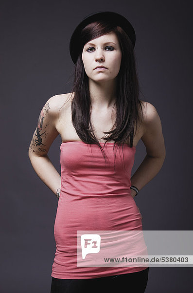 Young woman with tattoos  portrait