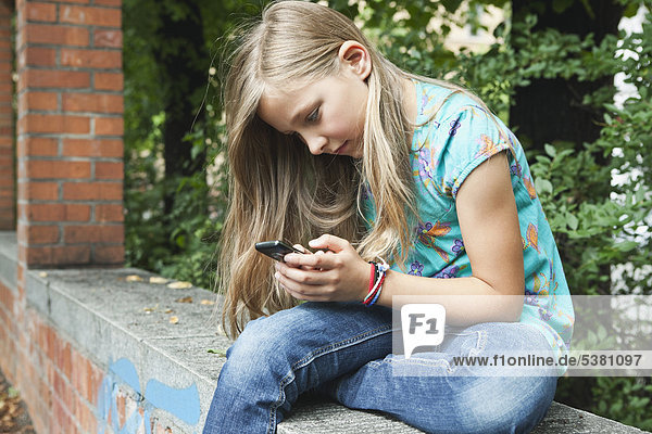 Girl using cell phone