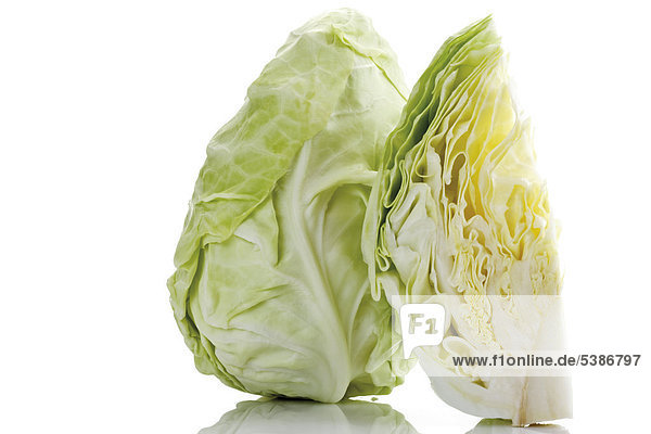 Pointed cabbage  whole and quartered head