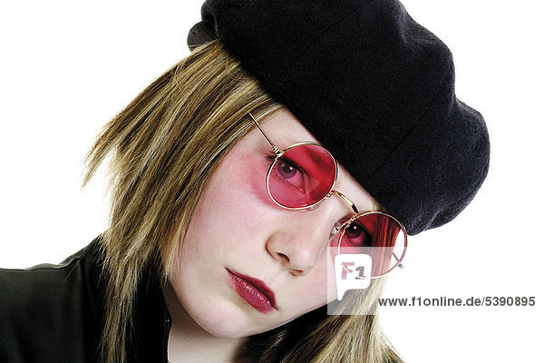 Girl wearing beret and rose-coloured glasses