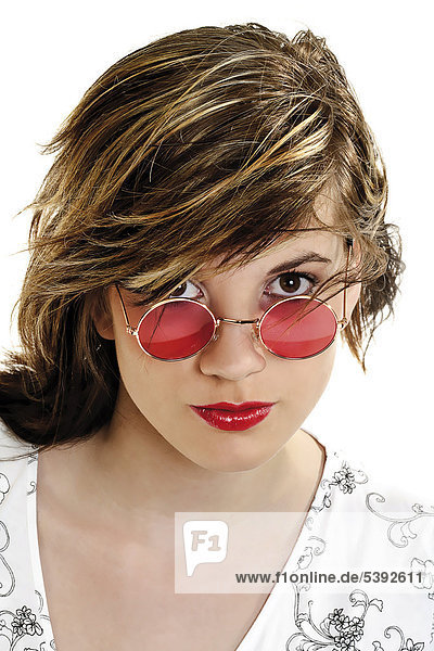 Young woman wearing pink sun glasses