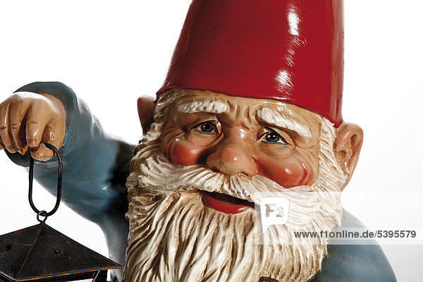 Large garden gnome holding a latern