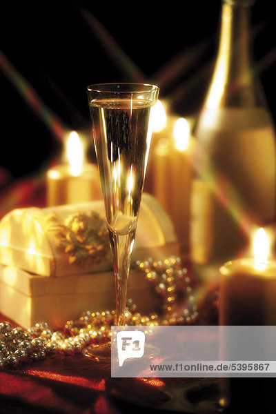 Champagne flute  festive mood with candles
