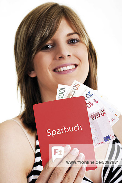 Young woman with a savings account book