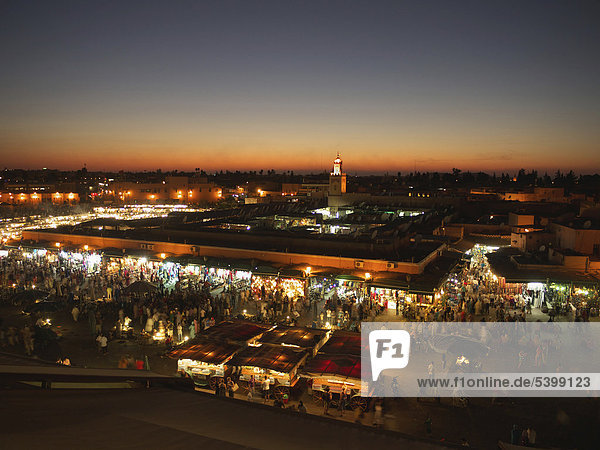 Djemaa el Fna square with Koutoubia Mosque at dusk  Marrakech  Morocco  North Africa  Africa