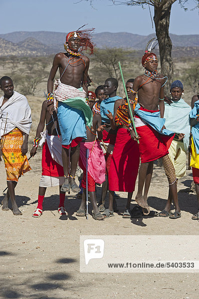 Masai warrior jump dance being performed for tourists  Samburu  Kenya  Africa