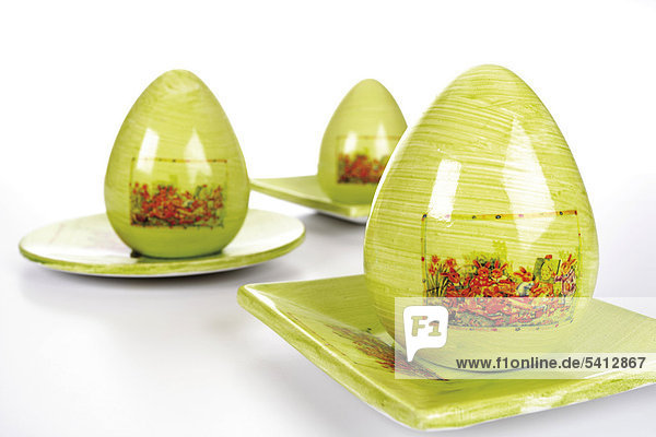 Painted easter eggs on plates