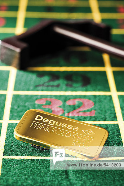 Gold bars on roulette table with slider