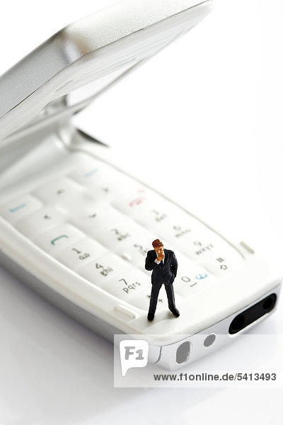 Manager figurine on opened mobile
