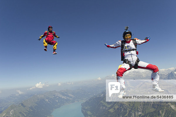Two female skydivers in the air