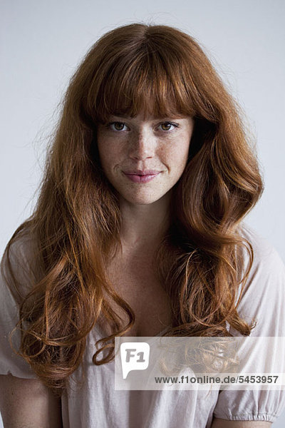 A beautiful young red haired woman  portrait