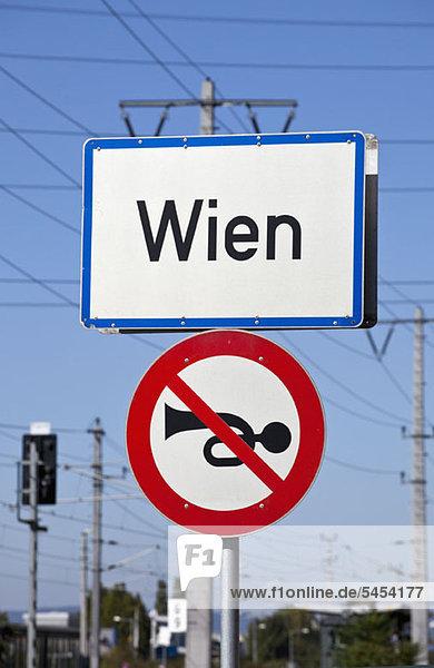 City sign for Vienna (Wien)  Austria with a sign denoting no car horns